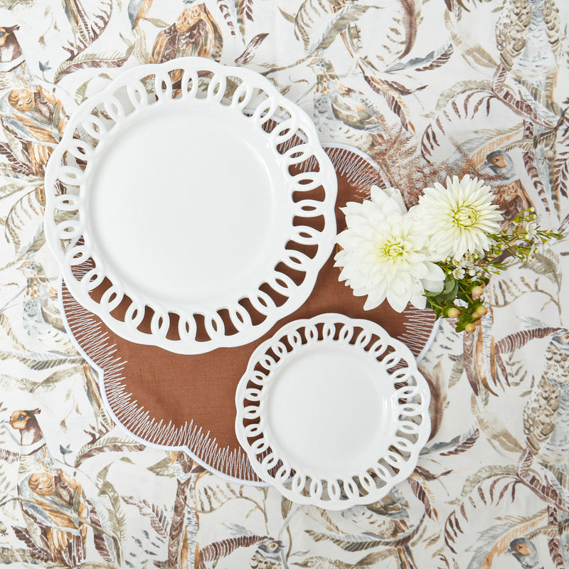 Enhance your holiday decor with the timeless beauty of our White Lace Dinner Plate Set, adding a touch of elegance and sophistication to your Christmas celebrations, ensuring your holiday feasts are served with flair.