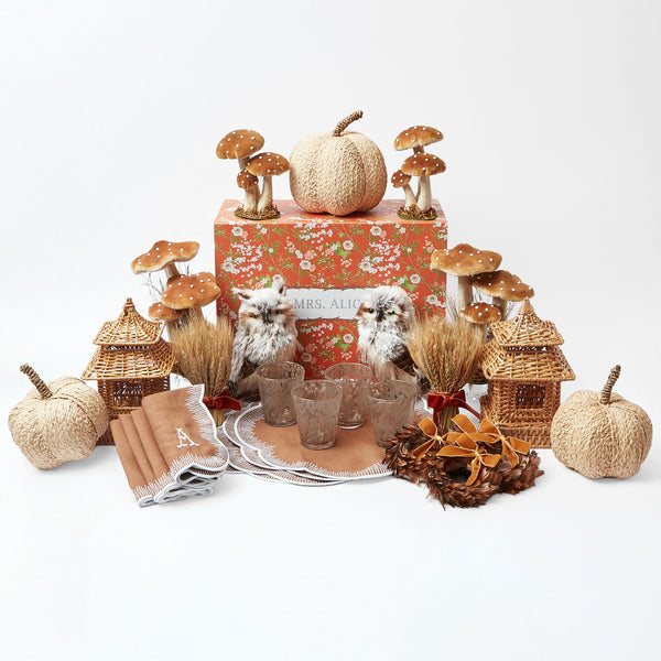 Elevate your table decor with the rustic elegance of the Raffia Harvest Tablescape.