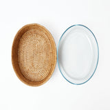 Rattan casserole basket for stylish and practical serving.