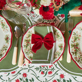 Make your table setting stand out with our set of 4 Ruby Red Velvet Napkin Bows, a symbol of timeless style.