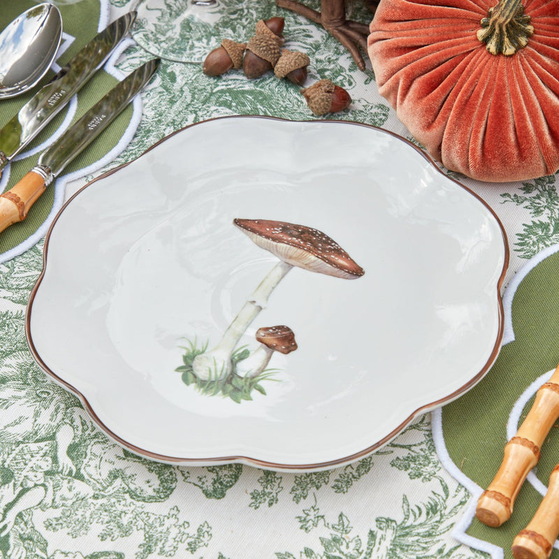 Infuse your appetizer course with style and charm with the Scalloped Mushroom Starter Plate in brown, now in a set of 24.