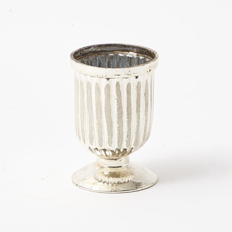 Add a touch of classic style to your space with the Small Mercury Fluted Vase Pair, perfect for creating a coordinated and inviting decor.