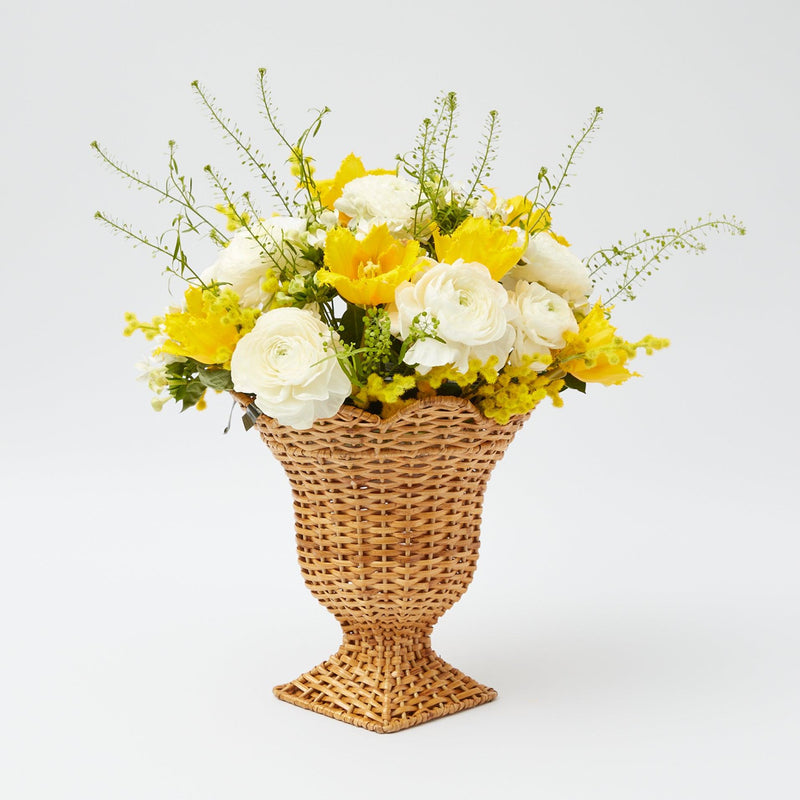 Tiny urn vase made from natural rattan, perfect for minimalist elegance.