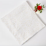 Transform your dining space with the Snowflake Applique Tablecloth - a winter wonderland on your table.