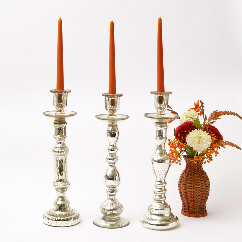 Celebrate the beauty of mercury glass with our trio of Tall Mercury Glass Candle Holders, a must-have for any glamorous gathering.
