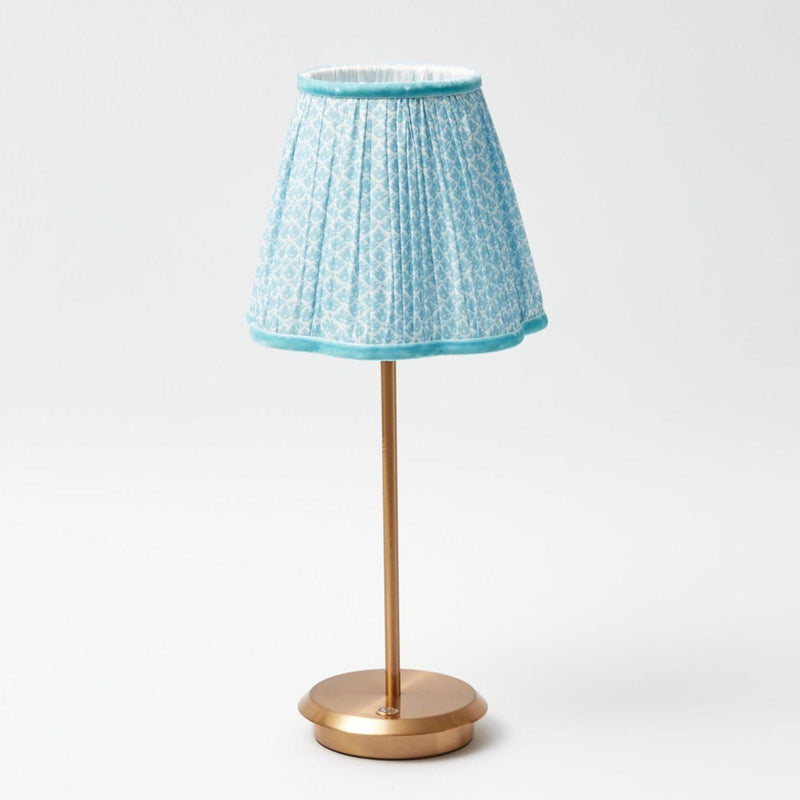 Add a touch of elegance to your interior with the Tall Rechargeable Table Lamp Stand, ideal for infusing your space with the captivating charm of the calming blue lampshade.