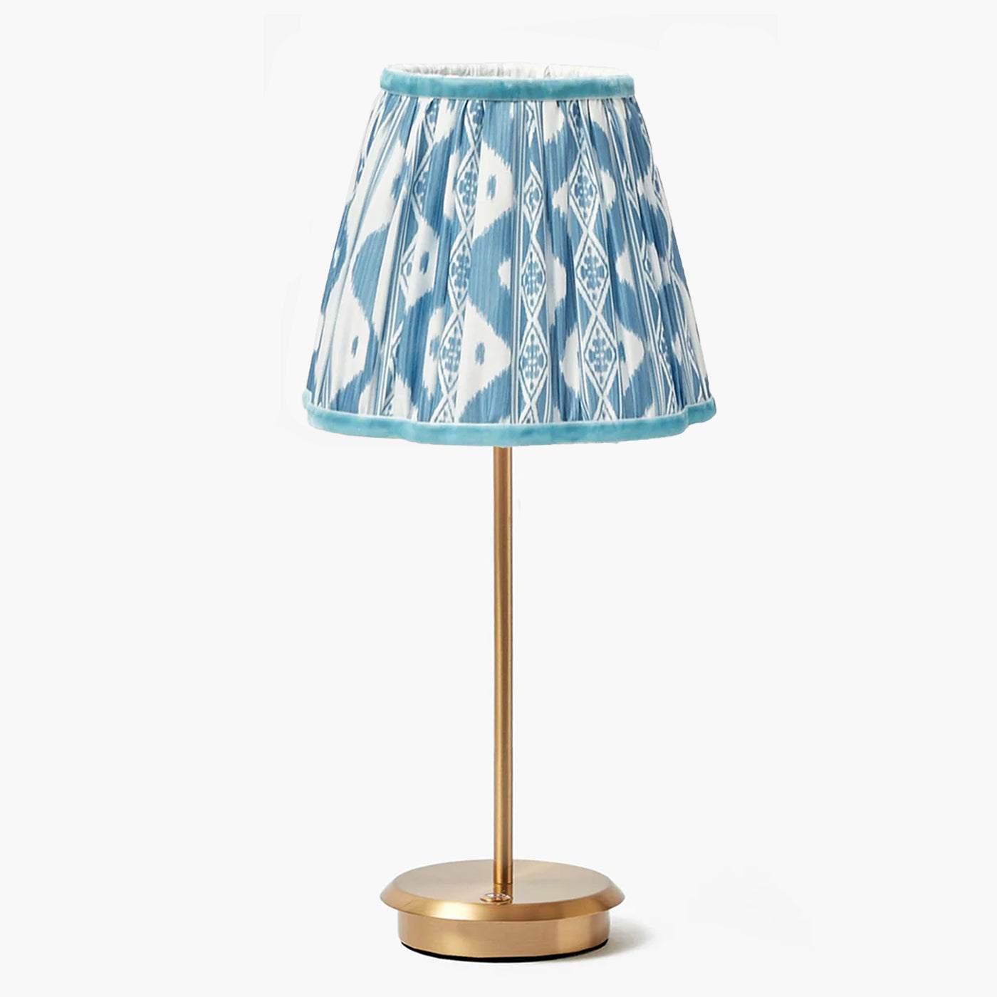 Illuminate your home in style with the Tall Rechargeable Lamp featuring a vibrant Blue Ikat Lampshade, a chic and cordless lighting solution that blends modern design with practicality.