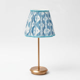 Turn your surroundings into a charming escape with the tranquil tones of a blue lampshade, courtesy of the Tall Rechargeable Table Lamp Stand, a lamp stand that exudes an inviting and serene atmosphere.