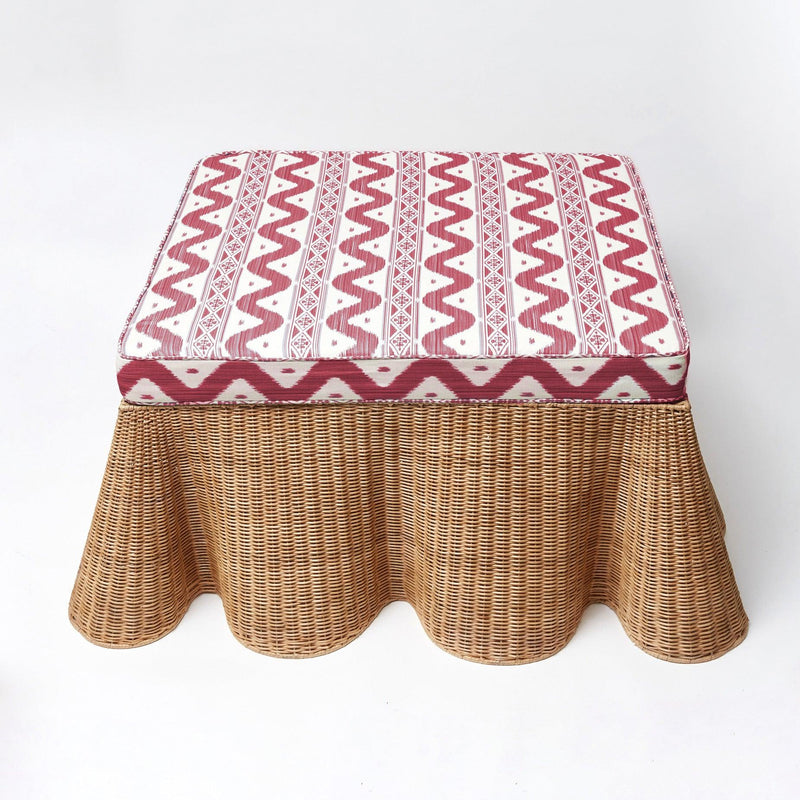 Illuminate your decor with the whimsical and enchanting Vivienne Rattan Scalloped Ottoman, designed to bring the natural beauty, extra seating, and style to your living area.