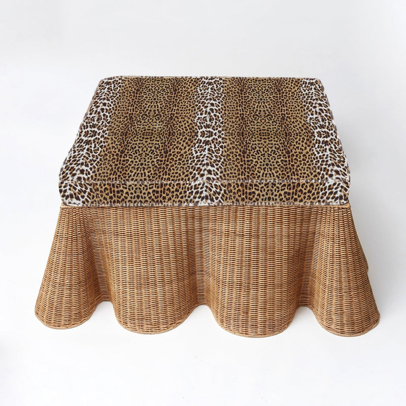 Elevate your decor with the whimsical and enchanting Vivienne Rattan Scalloped Ottoman - a simple yet stylish statement of coastal delight, multifunctionality, and elegance.