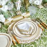Add a touch of classic style to your dining gatherings with the White & Gold Laurel Napkins, perfect for creating a coordinated and inviting table decor.