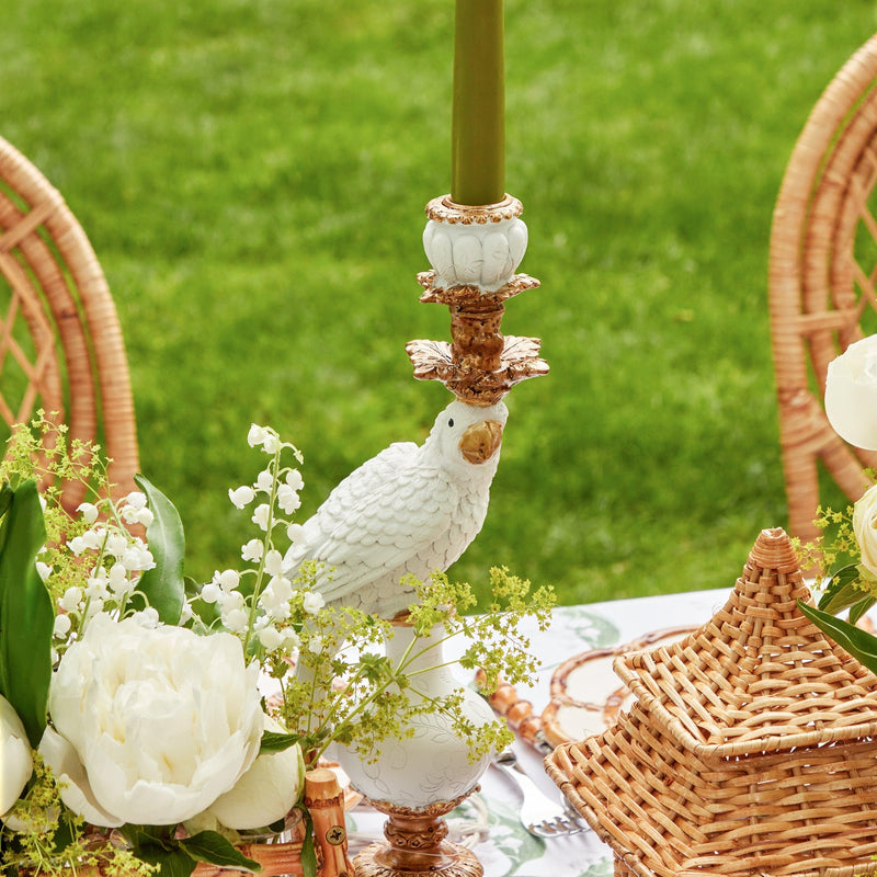 White Parrot Candle Holders: Artful tropical accents for ambiance.