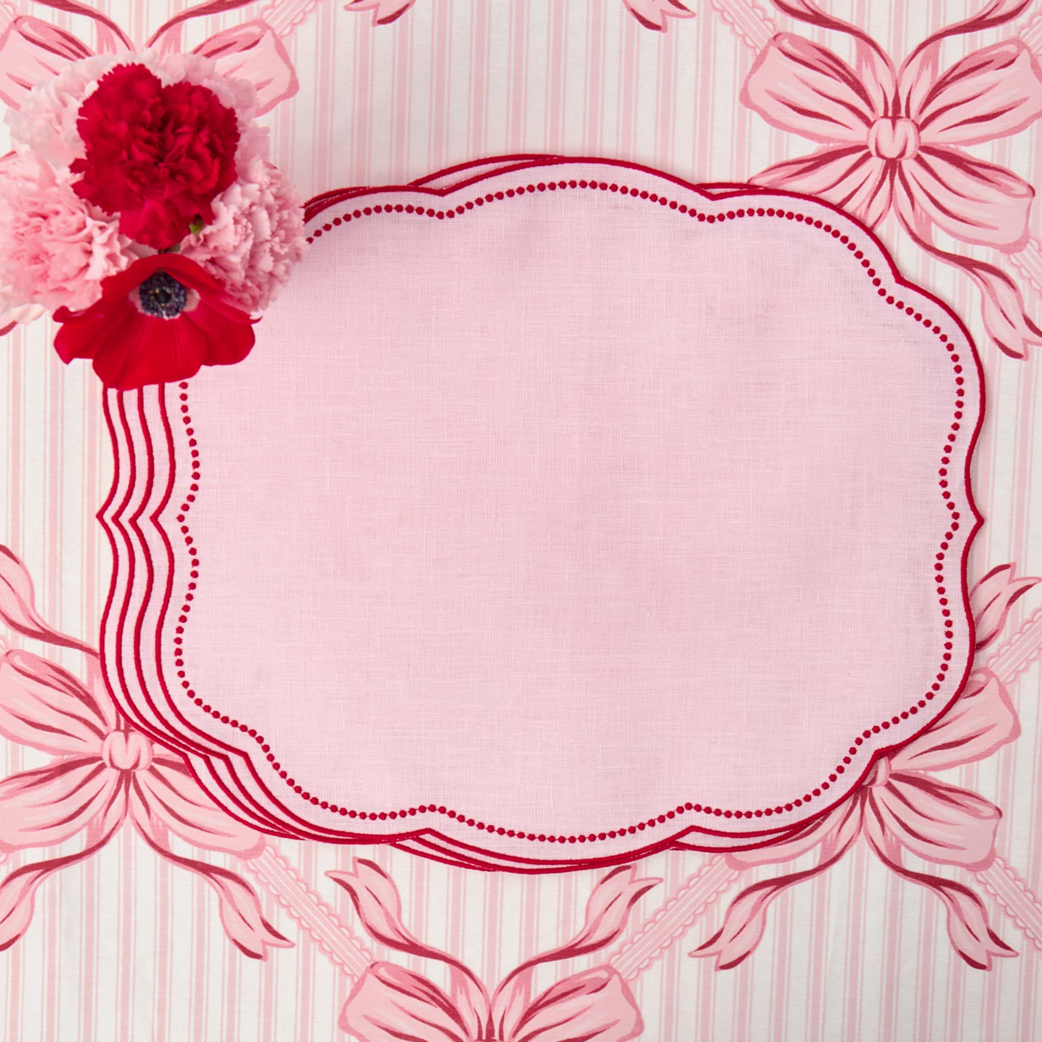 Decorative pink frame with flowers on a matching background