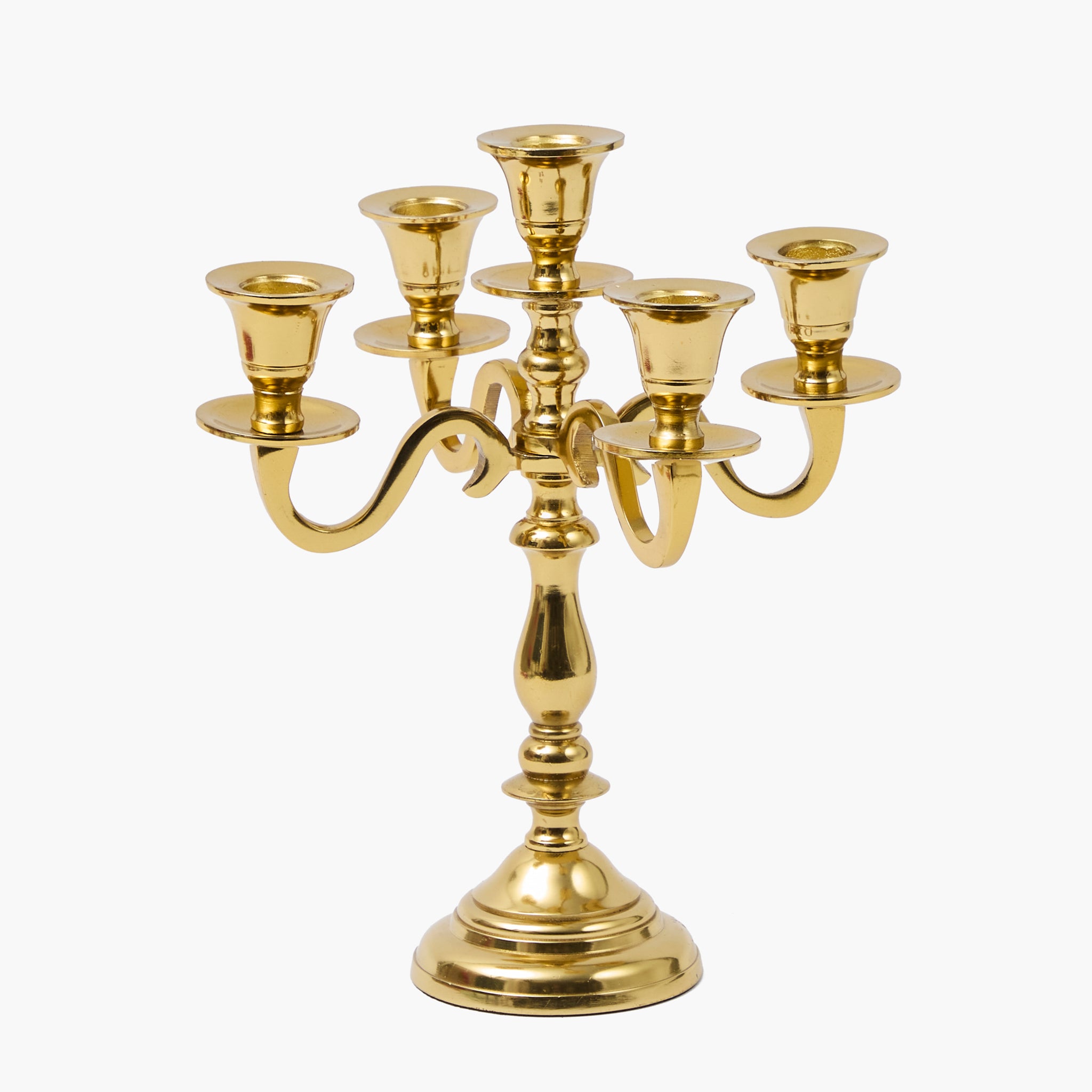 Gold candelabra on a white background