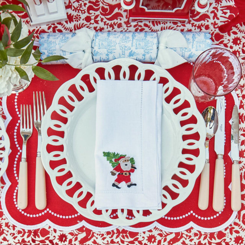 Make each holiday meal a celebration of craftsmanship with the White Hand Embroidered Father Christmas Napkins, a perfect addition to create a cozy and inviting Christmas atmosphere.
