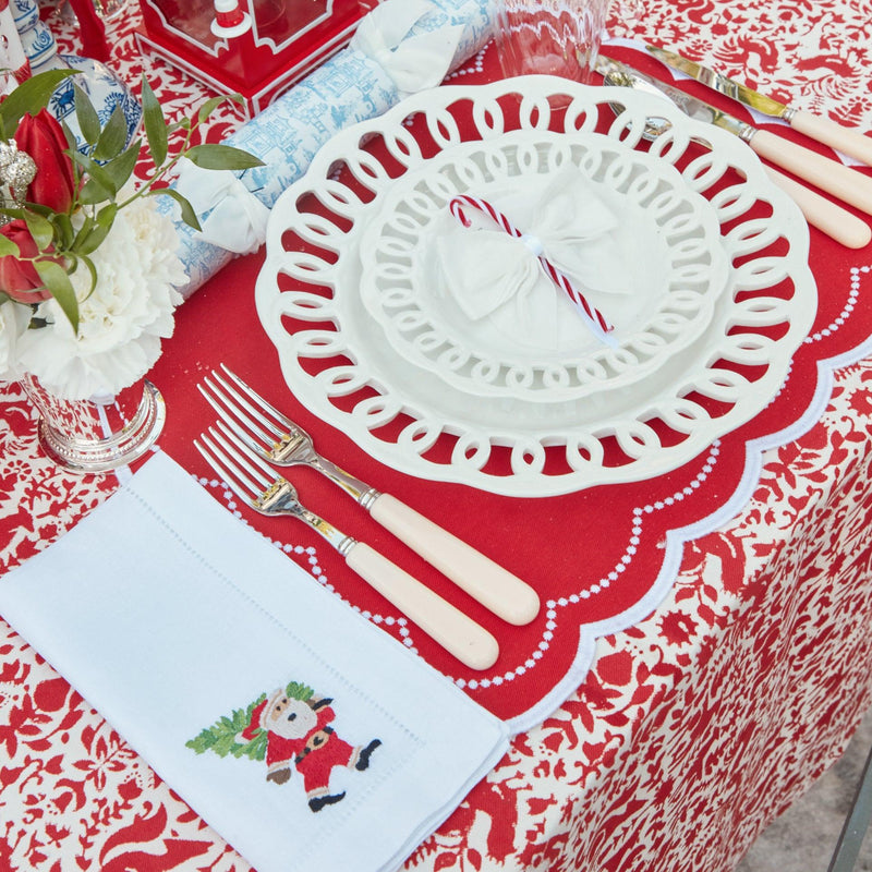 Elevate your Christmas decor with the intricate and enchanting beauty of the White Hand Embroidered Father Christmas Napkins, a tribute to the timeless elegance of holiday tradition with a handcrafted touch.