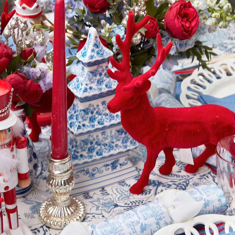 Add a touch of distinctive style to your Christmas decor with the Red Flocked Reindeer Family, perfect for creating a unique and magical Christmas atmosphere while celebrating the season with festive flair.