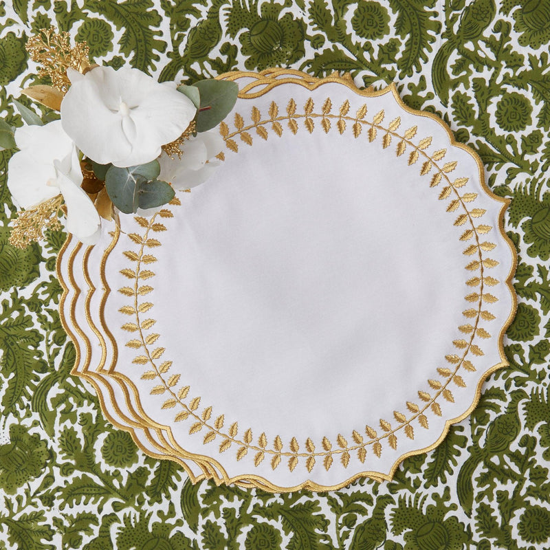 Add a touch of classic style to your dining gatherings with the White & Gold Laurel Placemats, perfect for creating a coordinated and inviting table decor.