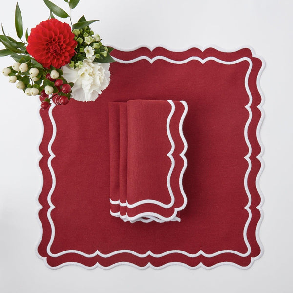 Elevate your holiday table setting with the Katherine Berry Red Napkins Set - a set of four that adds a touch of festive elegance to your dining experience.