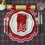 Make your holiday gatherings come alive with the playful charm of the Katherine Berry Red Napkins Set, a delightful set of four that captures the spirit of the season and adds a touch of holiday magic to your dining experiences, enhanced by the option of monogramming.