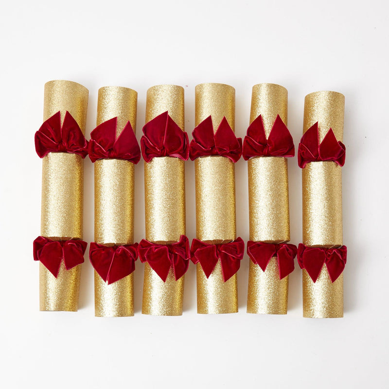 Enhance your holiday decor with the playful and delightful Gold Crackers with Red Velvet Bows Set, designed to bring a touch of tradition and whimsy to your Christmas parties.