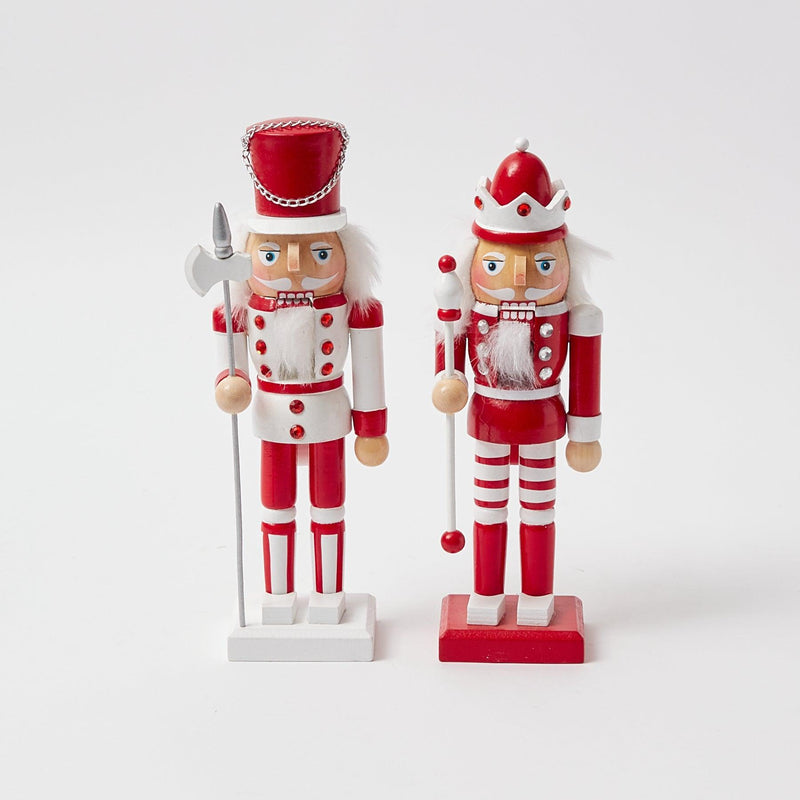 Add a touch of whimsical charm to your Christmas decor with the Candy Cane Nutcracker Pair - a delightful addition to create a festive and joyful holiday atmosphere.