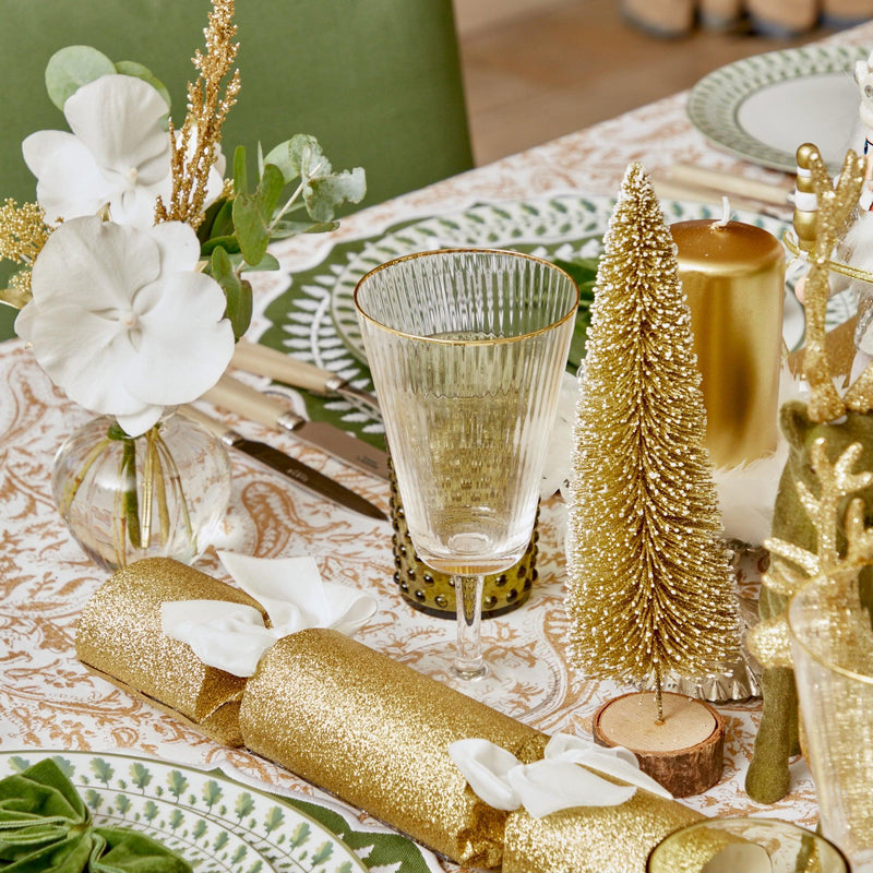 Make each holiday moment a celebration of tradition with our Set of 3 Gold Glitter Trees.
