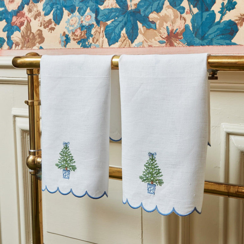 Add a touch of holiday charm to your Christmas celebrations with the Embroidered Christmas Tree Linen Hand Towel, perfect for creating a festive and inviting atmosphere.