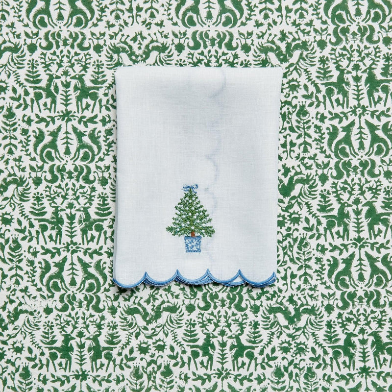 Enhance your holiday decor with the playful and delightful Embroidered Christmas Tree Linen Hand Towel, designed to bring a touch of tradition and whimsy to your Christmas festivities.