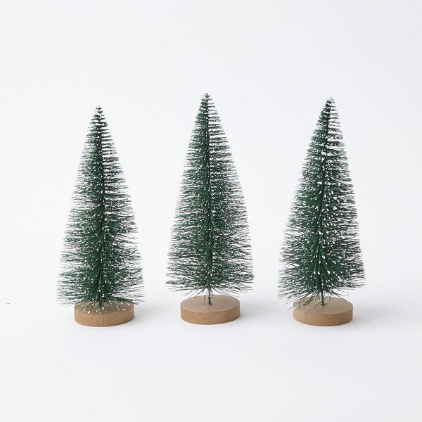 Elevate your holiday decor with our Set of 3 Small Snow Dusted Christmas Trees - a charming trio of winter elegance.