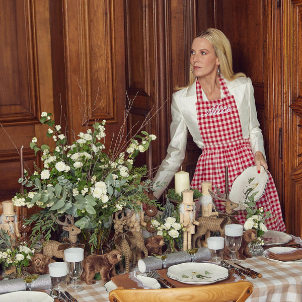 Elevate your cooking experience with the Swiss Red Frilled Gingham Apron, designed to bring a touch of country charm to your culinary adventures.