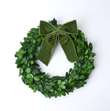 Celebrate the beauty of Christmas with our Medium Boxwood Wreath, a must-have for any festive gathering.