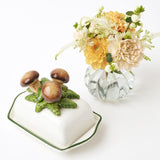 Impress your guests with the whimsical appeal of the Porcini Mushroom Butter Dish, adding a touch of nature to your dining decor.