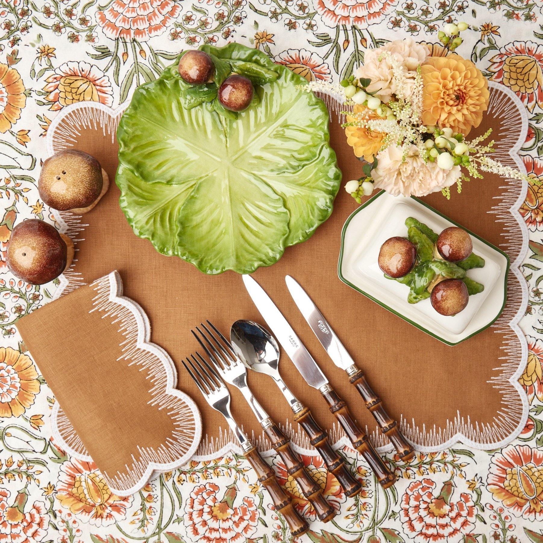 Make a statement with the artful Porcini Mushroom Butter Dish, blending style and functionality for a tasteful presentation.